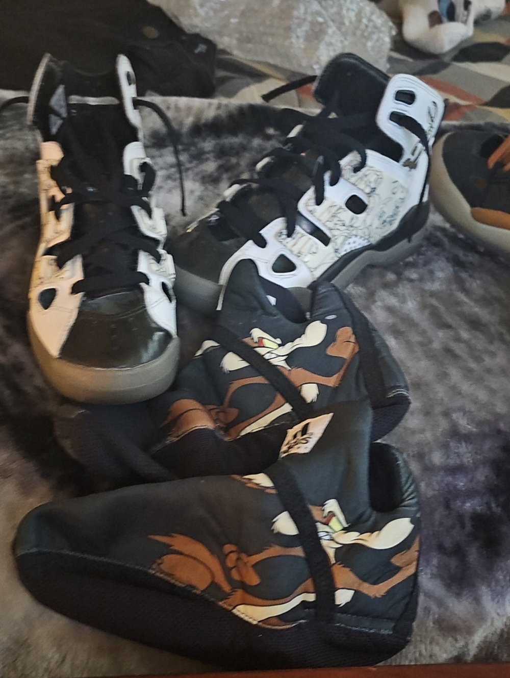 Womens  Black and White High-Top Sneakers with Cartoon Boot Covers $35 Each